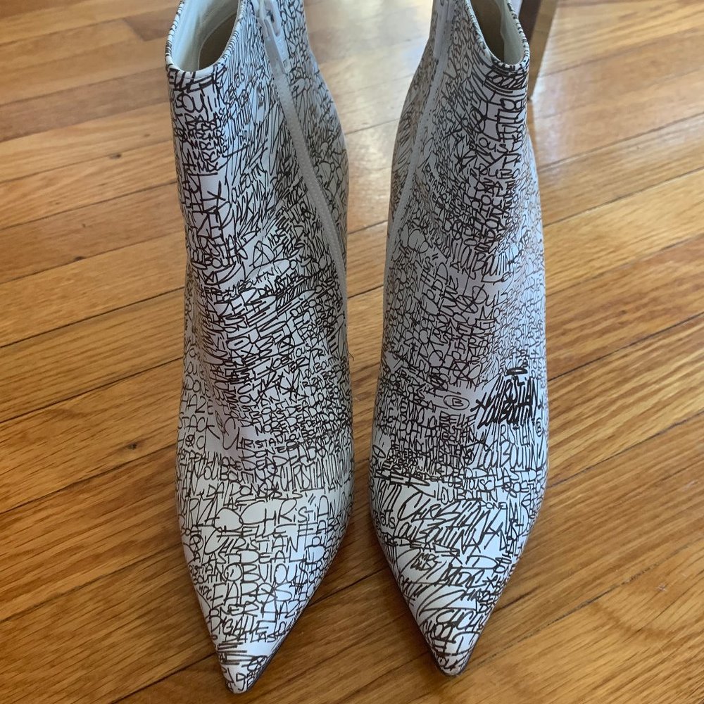 Funky Newspaper Style Christian Louboutin Boots